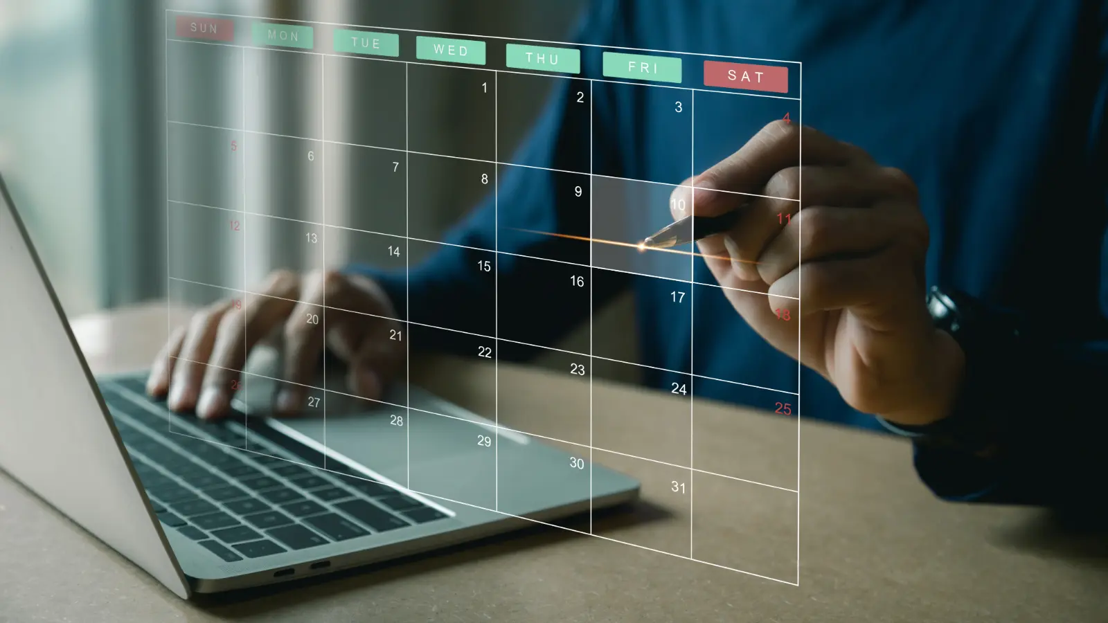 Photo of a person's hands at a laptop with an overlay graphic of a calendar.