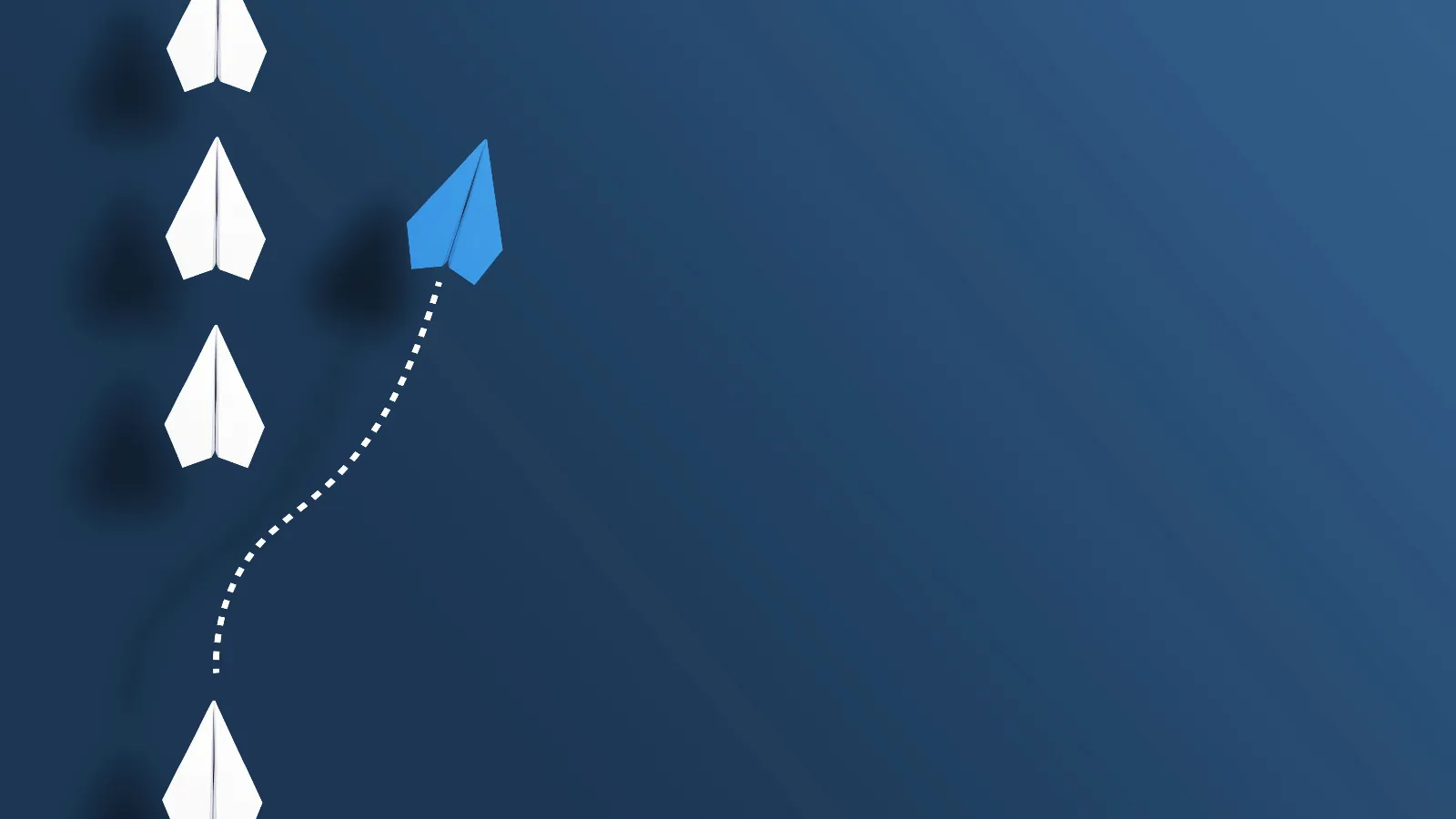 A graphic of a line of paper airplanes with one veering off to the right.