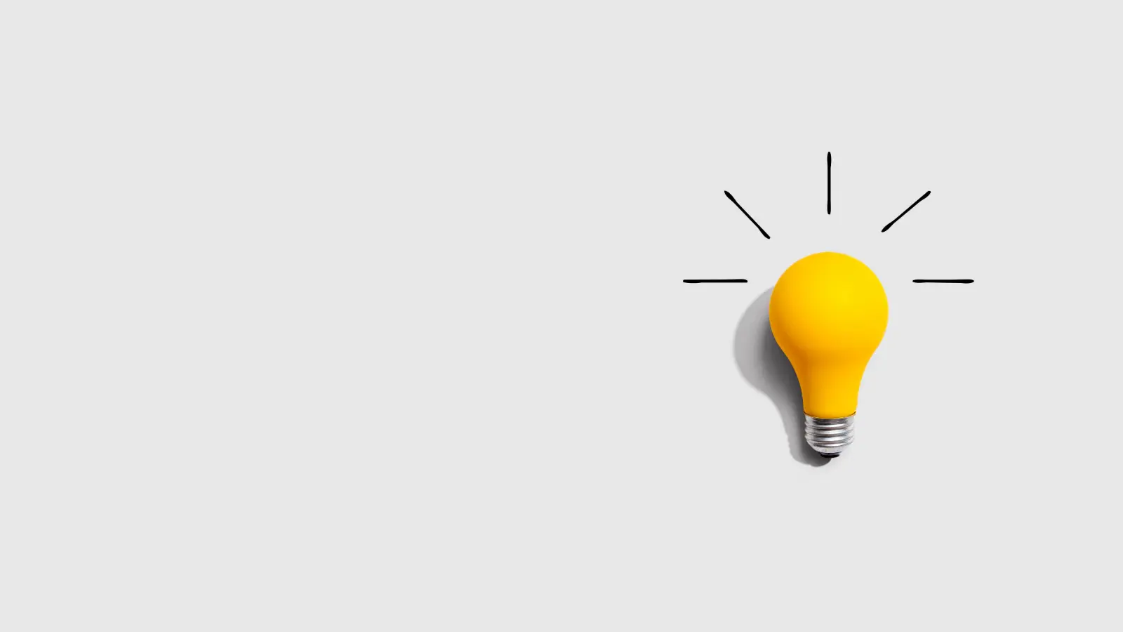 Grey background with a single yellow lightbult with hashmarks to sybmolize an "aha" moment.